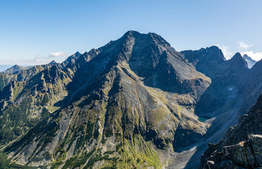 Ice Peak (Ladovy stit, Lodowy Szczyt) - view of the summit, surrounding mountain ridges and valleys in summer scenery.