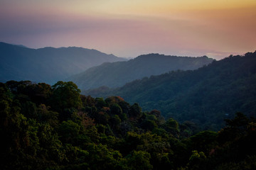 Obraz premium Lush Purple and orange Sunset over the hills in Colombia