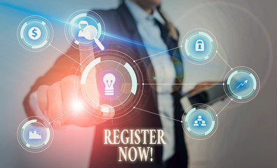 Text sign showing Register Now. Business photo text official list or record showing or things into web or forum Woman wear formal work suit presenting presentation using smart device