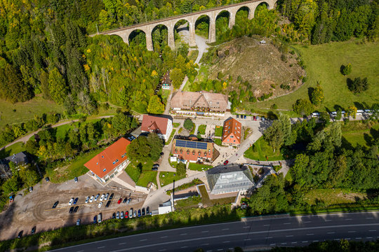 An aerial panorama of Breitnau (Germany) with autumn trees