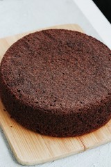 Delicious chocolate cake on a wooden table
