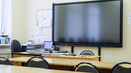 Moscow, Russia - October, 04, 2019: image of electronic board in the classroom