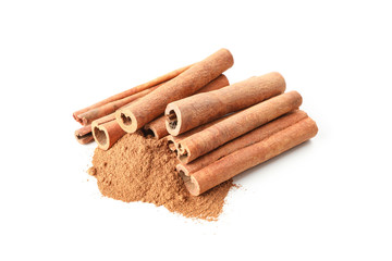 Cinnamon sticks and powder isolated on white background. Sweet spice