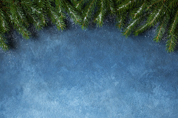 Christmas background for greetings, text, with fir branches and snow