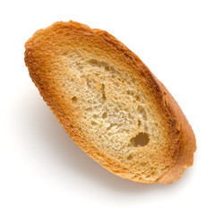 Toasted baguette slice isolated over white background close up.  Toast, crouton.   Top view..