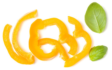 Naklejka na ściany i meble Yellow pepper slices with basil leaves isolated over white background cutout. Top view, flat lay..