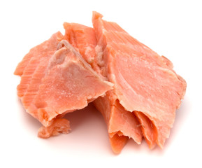 smoked salmon segments isolated over white background cutout. Prepared fish fillet fibres. .