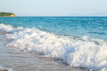 Small blue waves at sea and sky