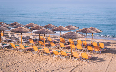 Beach with chairs and umbrellas