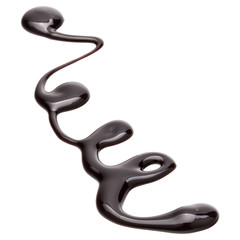 Obraz premium Chocolate syrup drop isolated on white background