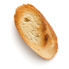 Toasted baguette slice isolated on white background close up.  Toast, crouton.   Top view.