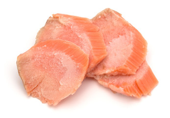 smoked salmon segments isolated on white background cutout. Prepared fish fillet fibres.