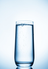 water glass on blue background