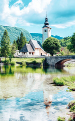 Fototapeta na wymiar Scenery with Church St John Baptist Bohinj Lake of Slovenia