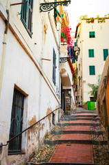 Fototapeta na wymiar Traditional cozy street in city San Remo, Italy
