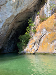 Natural rocky arch with lake