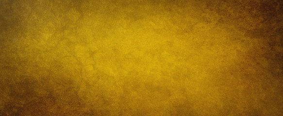 Obraz premium Old brown paper background with texture grain and grunge, distressed gold color with black border
