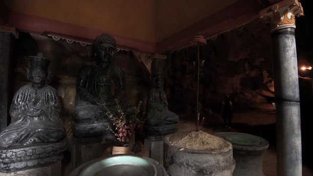 A small shrine inside a cave at Bich Dong Pagoda, Tam Coc, Vietnam