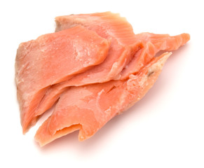 smoked salmon segments isolated on white background cutout. Prepared fish fillet fibres.