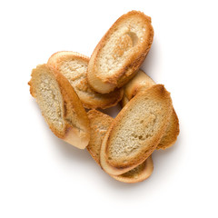 Toasted baguette slices isolated on white background close up.  Toast, crouton.   Top view.