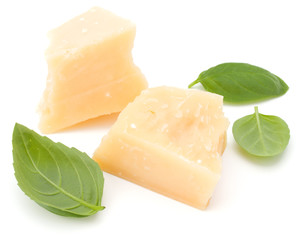 shredded parmesan cheese and basil leaf isolated on white background cutout