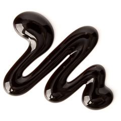 Chocolate syrup drop isolated on white background. Top view. .