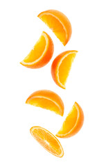 falling fresh orange fruit slices isolated on white background closeup. Flying food concept. Top view. Flat lay. Orange slice in air, without shadow. - 299437159