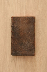 antique rare book on wooden table.