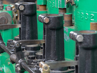 Closeup of engine parts in industrial area