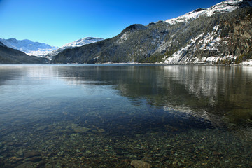 Fototapeta na wymiar St. Moritz, Switzerand with lake and snowy mountains