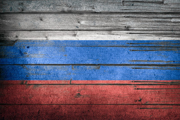 Russian national flag on wooden rustic background. Patriotism and world flags concept.