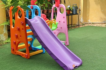 Children's slider playground in park