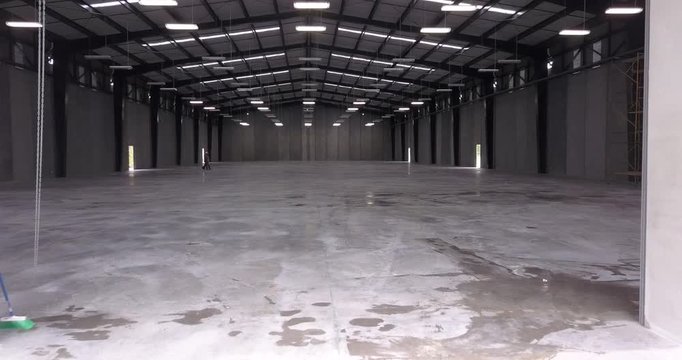Cinematic view of an empty  warehouse