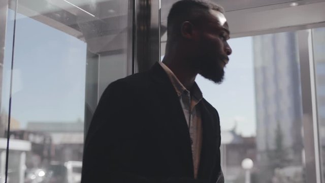 Entrepreneur taking elevator