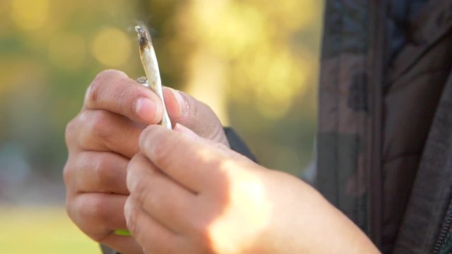 closeup of burning joint in slow motion