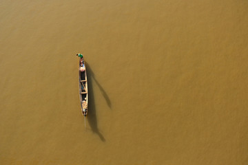 Fisherman he fishing in Khong river is simple lifestyle work in Laos country.