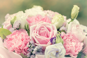 Colorful multiplicity roses background, shallow depth of field. retro vintage instagram filter for background and text.