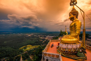 Wat Tham Seua Krabi-Krabi: 20 October 2019, atmosphere of a large Buddha statue on a high mountain, with tourists always coming to make merit, Tiger Cave Mountain Temple, Krabi area Noi, Thailand