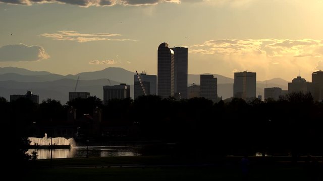 Denver skyline as seen from the City Park at sunset