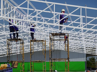 Workers painted the roof structure on the construction site