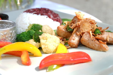 fried pock with vegetables