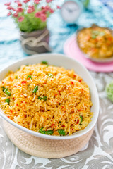 A plate of delicious home cooked fried rice which is popular in Malaysia, Indonesia, Thailand and Singapore