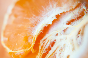 Middle part of peeled orange mandarin closeup