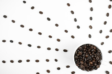 Coffee beans on a white background, break time, morning to start the day.