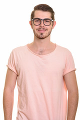 Obraz premium Portrait of young handsome bearded man with eyeglasses