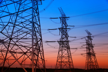 Fototapeta premium Wire electrical energy at sunset