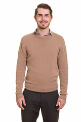 Fototapeta premium Portrait of happy young handsome bearded man