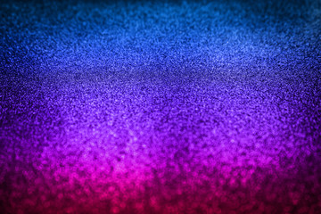 colorful blue and violet glittering effect background.