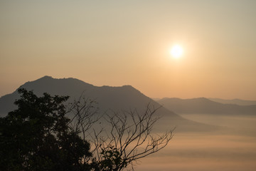 Natural scenery in the morning, the sun is rising and fog