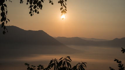 Natural scenery in the morning, the sun is rising and fog